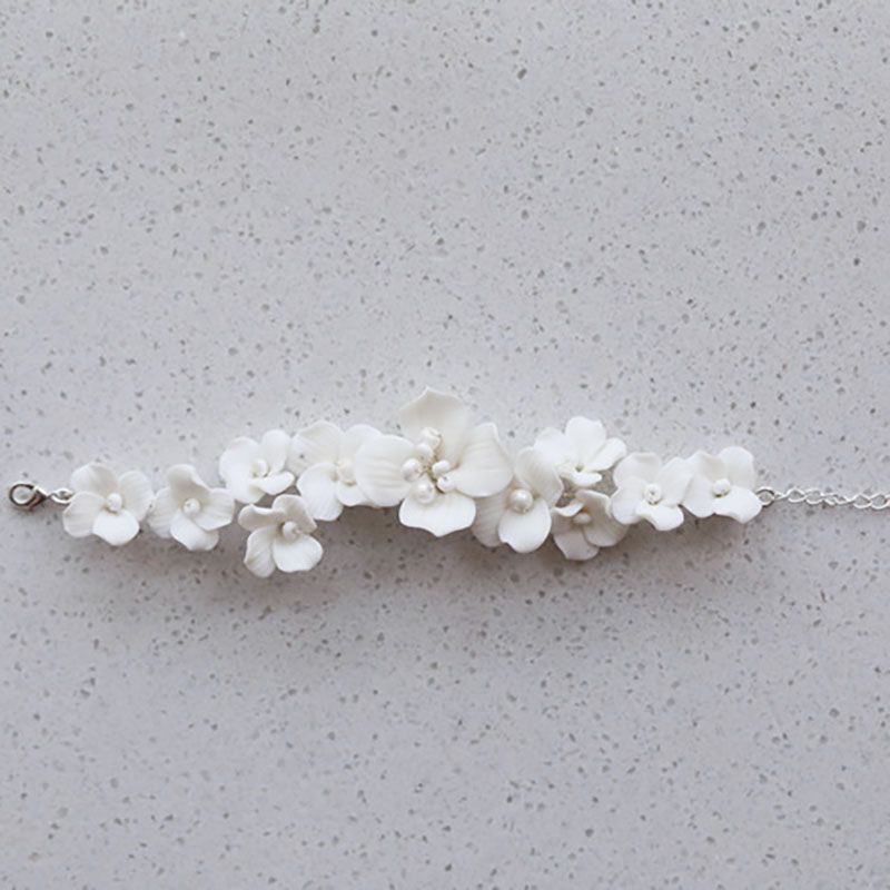 女性のための花の形をした白い磁器のブレスレット,手作りのアー - Snake Plant Ceramic のレビューと価格